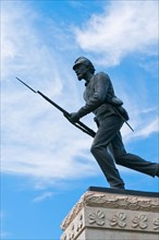 USA, Pennsylvania, Gettysburg, Cemetery Ridge, statue of soldier. Photo : Chris Grill