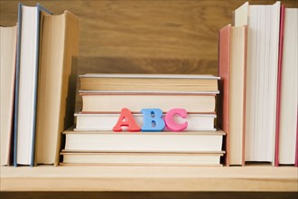 Row of books on shelf. Photo : Jamie Grill