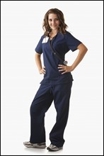 Portrait of young nurse on white background. Photo : Mike Kemp