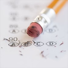 Pencil with eraser on school test sheet. Photo : Jamie Grill