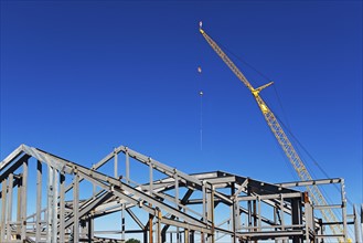 Construction frame and crane. Photo : fotog