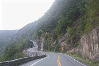 Winding road through mountains. Photo : David Engelhardt