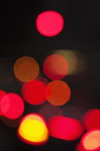 USA, New York City, City lights out of focus.
