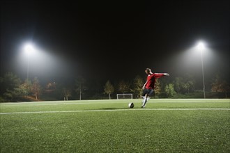 USA, California, Ladera Ranch, Football player preparing for penalty kick.