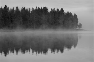 USA, Oregon, lake with fog. Photo : Gary J Weathers