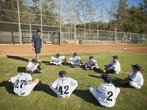 USA, California, Ladera Ranch, Coach training boys (10-11) from little league.