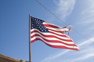 USA, Arizona, Winslow, American flag on wind. Photo : David Engelhardt