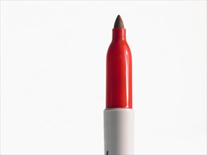 Studio shot of red felt-tip pen. Photo : David Arky