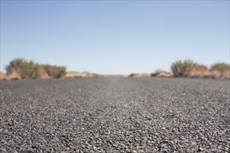 USA, Arizona, Winslow, Country road, surface level. Photo : David Engelhardt