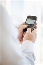 USA, New Jersey, Jersey City, Man holding mobile phone .