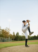 USA, California, Ladera Ranch, boy (10-11) playing baseball.