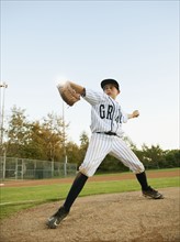 USA, California, Ladera Ranch, boy (10-11) playing baseball.