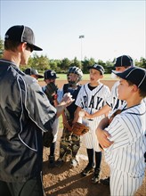 USA, California, Ladera Ranch, coach training little league baseball team (10-11).