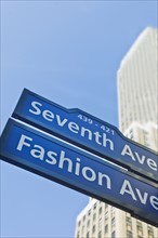 USA, New York, New York City, Street sign for Fashion Avenue and Seventh Avenue in Manhattan.