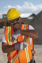 Portrait of construction worker on building site. Photo : Dan Bannister