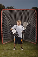 USA, Utah, Provo, Portrait of junior (6-7) lacrosse player in goal. Photo : FBP