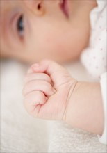 USA, New Jersey, Jersey City, Close-up view of baby girl (2-5 months). Photo : Jamie Grill
