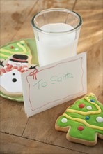 Letter to Santa with Christmas cookies and milk.