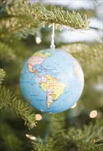 Globe bauble on Christmas tree. Photo : Jamie Grill Photography