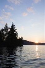 USA, New York State, Adirondack Mountains, Upper Saranac Lake at sunset. Photo : Chris Hackett