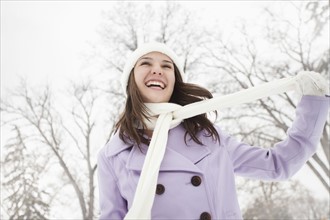 USA, Utah, Lehi, Young woman wearing winter coat outdoors. Photo : Mike Kemp