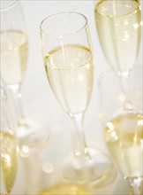 Close up of champagne flutes. Photo : Jamie Grill Photography