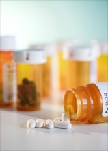 Close up of pills and pill containers. Photo : Jamie Grill Photography