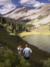 USA, Colorado, Senior couple hiking in mountains. Photo : John Kelly
