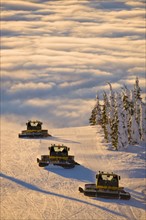 USA, Montana, Whitefish, Snowmobile on ski slope. Photo : Noah Clayton
