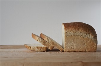 Close up of bread slices on cutting board.