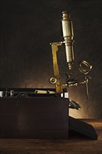 Close up of antique microscope.