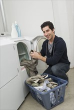 Man doing laundry.