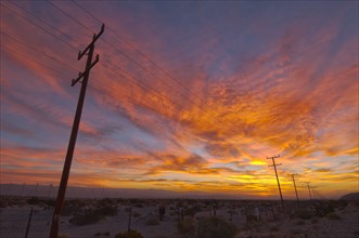 USA, California, Palm Springs, power line at sunrise. Photo : Gary Weathers