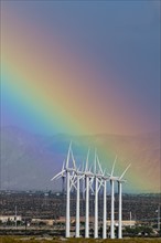 USA, California, Palm Springs, rainbow over wind turbines. Photo : Gary Weathers