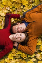 USA, Montana, Kalispell, Happy couple embracing in autumn. Photo : Noah Clayton