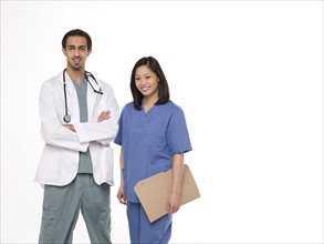 Portrait of young doctor and female nurse. Photo : Dan Bannister