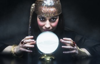 Gypsy woman with crystal ball.