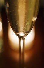 Close-up view of champagne glass.