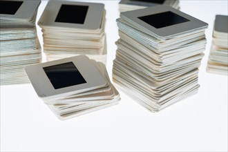 Close up of slides in piles on light box.