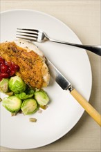 Chicken meal with brussels sprouts. Photo : Joe Clark