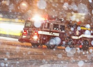 USA, New York City, Fire engine in blizzard.