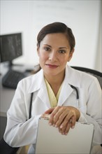 Portrait of smiling female doctor.