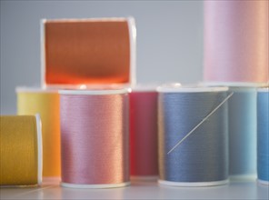 Spools with colorful threads. Photo: Jamie Grill Photography