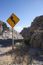 USA, Colorado, Road sign in mountains. Photo: Noah Clayton