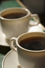 Close up of two coffee cups. Photo : Antonio M. Rosario