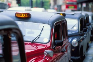 UK, England, London, Row of cabs. Photo: Antonio M. Rosario