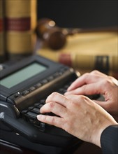 Court stenographer using stenograph machine. Photo: Daniel Grill