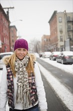 USA, New Jersey, Jersey City, woman walking on street. Photo: Jamie Grill Photography