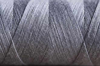 Close-up view of silver string spool. Photo : Kristin Lee