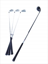 Golf clubs on white background. Photo : David Arky